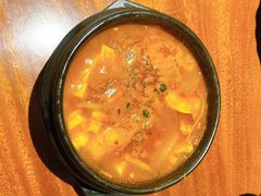 辣白菜海鲜豆腐汤-肉魁屋·烧肉·烧鸟·酒场(高新店)