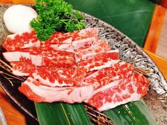极品浇汁肥牛肋条-草家酱蟹炭火烤肉店(珲春南路一店)