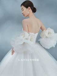 -雪中彩影婚纱摄影·微光艺术中心