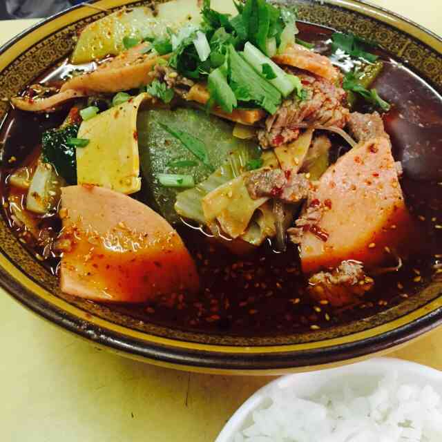 来一碗老冒菜-"在万人公寓对面的口子上,现在比较不好的是.