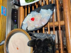 -老牌坊云南鱼豆花火锅(哈西万达店)