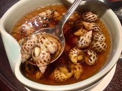 古越陈酿煮花螺-杭州西子湖四季酒店·金沙厅