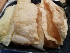 炸豆皮-哥老官重庆美蛙鱼头(宝山龙湖店)