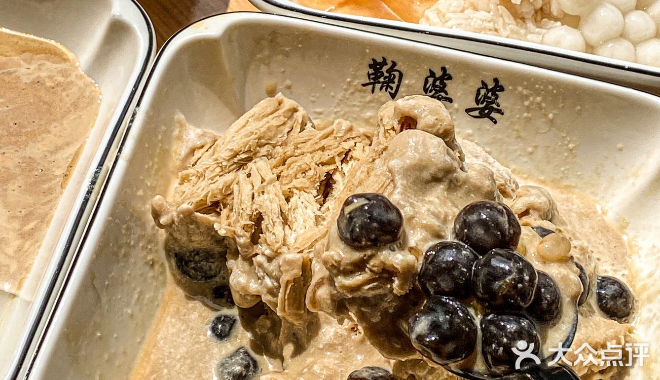 打动车来乐山必吃的一碗黑米凉糕‼️