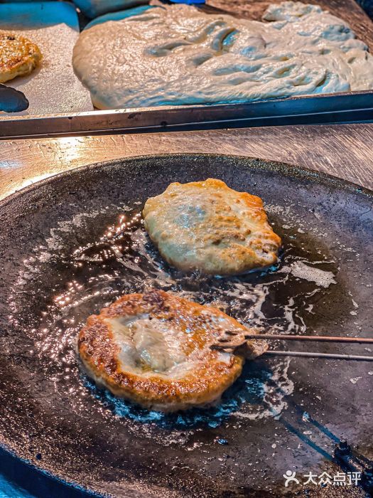 冯四孃跷脚牛肉·非物质文化遗产店红糖饼图片