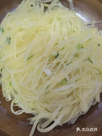 于是坐了辆出租车让司机带住找吃的