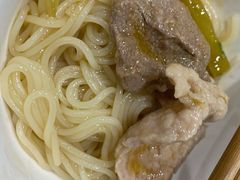 特色酸菜肉片米线-巴鑫田姐米线(巴南万达店)