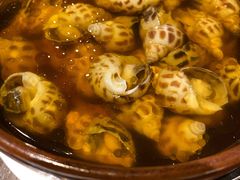 古越陈酿煮花螺-杭州西子湖四季酒店·金沙厅