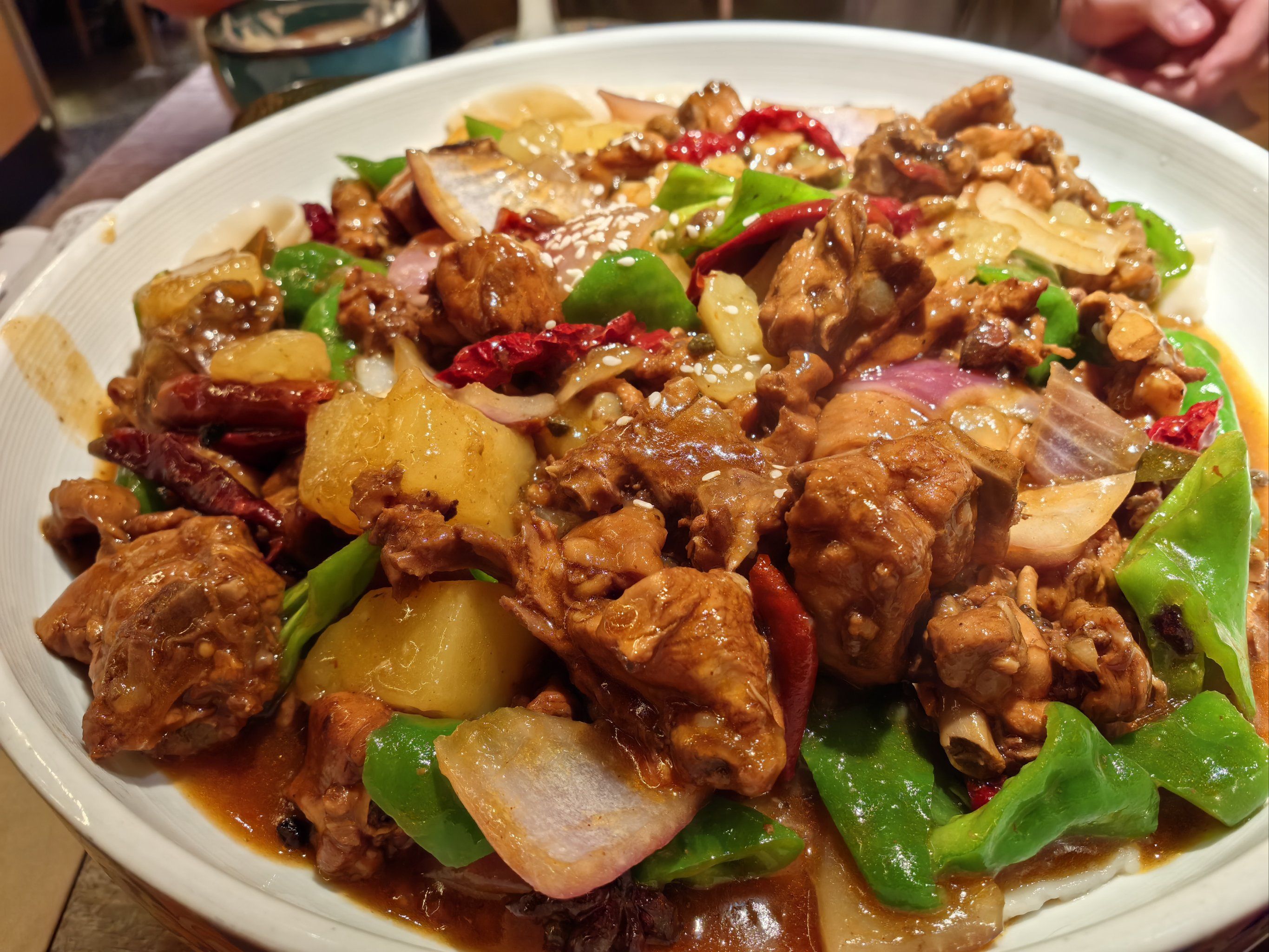 沙湾大盘鸡味道很好,辣得很合适,天池豆腐