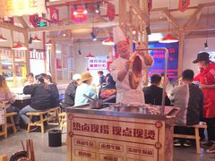 卖卤味的大叔-贤合庄卤味火锅(时代广场店)