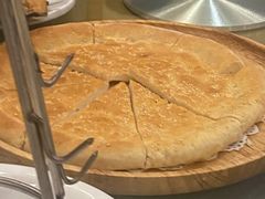 馕坑芝麻馕-巴扎美食·新疆菜·西域歌舞表演餐厅(新疆大厦店)
