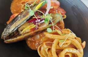 Mediterranean Tomato Seafood Wide Noodles