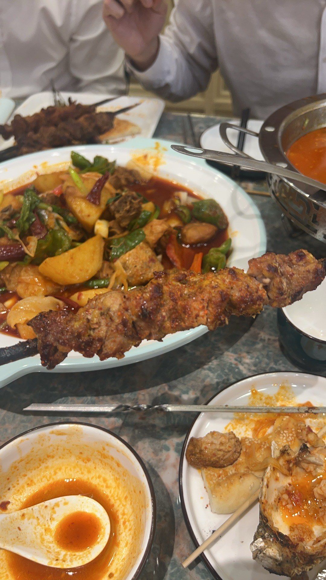 探索新疆美食的旅程在帕米尔餐厅得到了完美