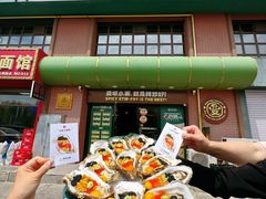 -曼听小寨海鲜烧烤·大连辣炒大王(盖州街店)