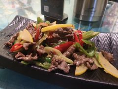 酸木瓜炒牛肉-紫滇源云南生态菜(丹凤街店)