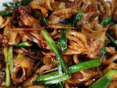 葱爆鱿鱼筒-明记海鲜大排档(巽寮湾店)