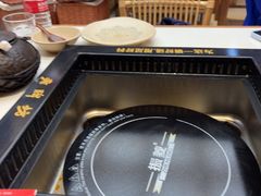 -老牌坊云南鱼豆花火锅(哈西万达店)