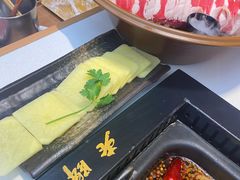 -老牌坊云南鱼豆花火锅(哈西万达店)