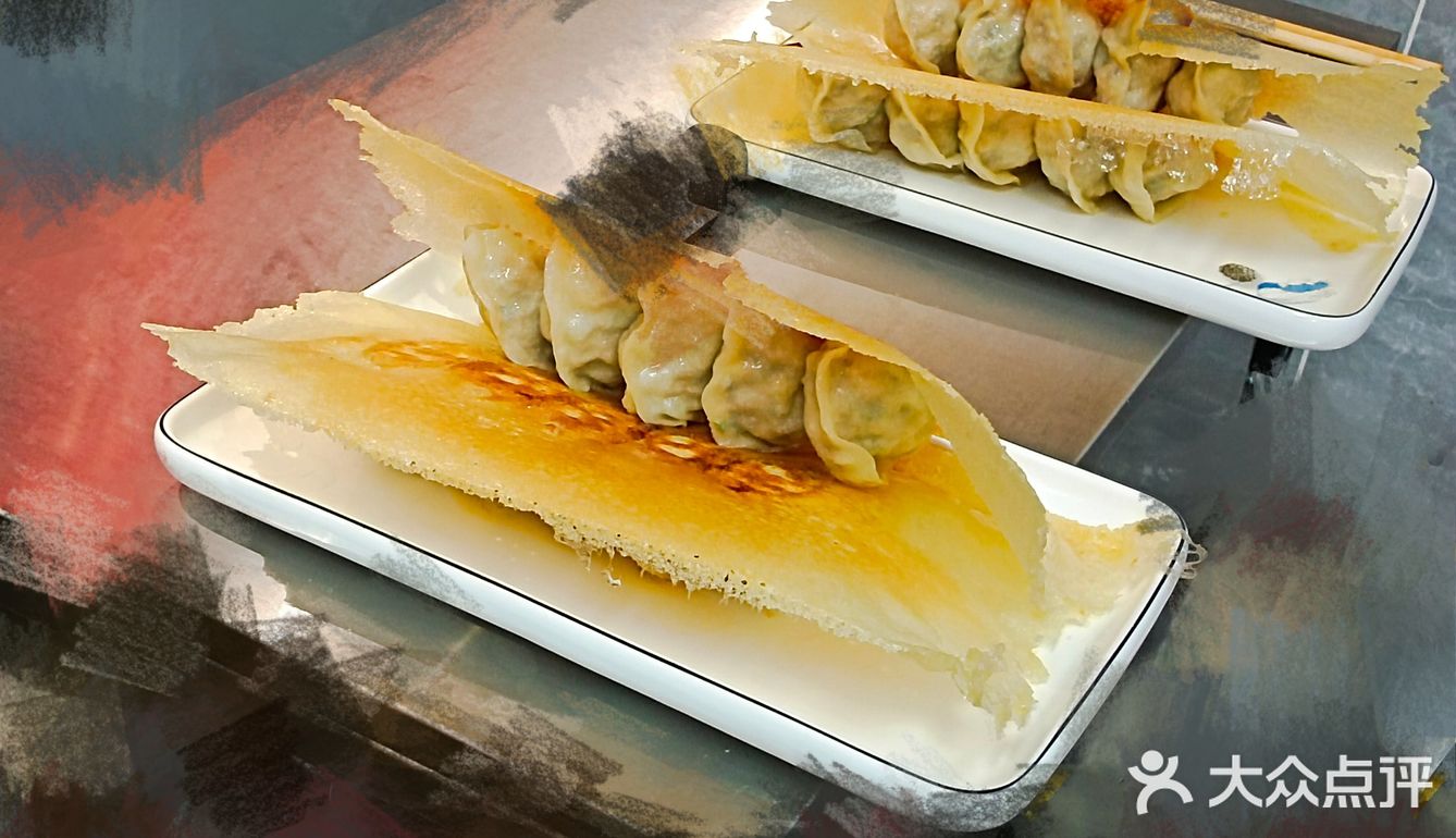 别人家锅贴都是开口，而他家锅贴的锅贴也是与众不同