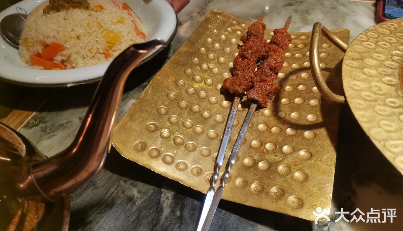 「北疆饭店(三峡广场店)」 「新疆羊肉串」非常大的一
