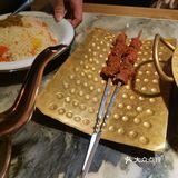 「北疆饭店(三峡广场店)」 「新疆羊肉串」非常大的一