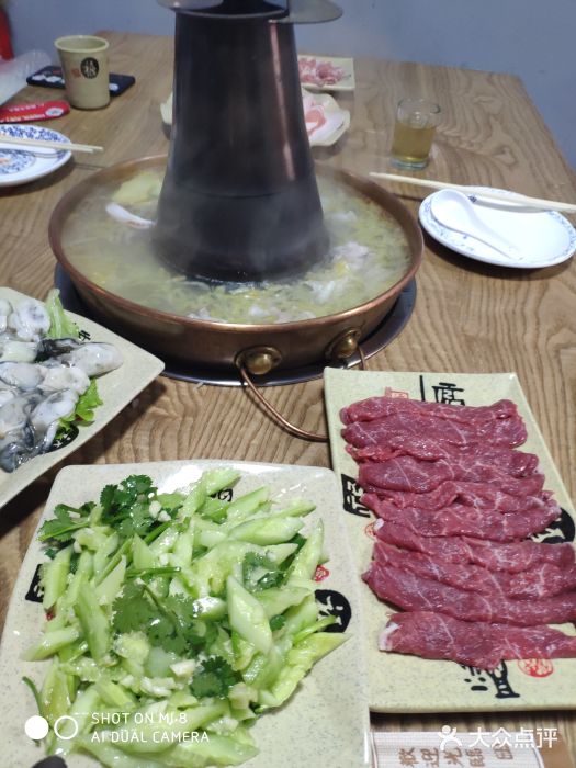 牛九铜火锅图片