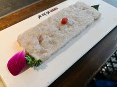 -老牌坊云南鱼豆花火锅(哈西万达店)