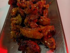 云南爆辣生烤鸡爪-一家破烧烤店·辣卤海鲜·小排档(光谷店)