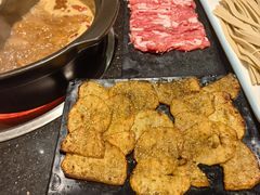 -明何记涮牛肚(品牌首店隋唐植物园南门古城路店)