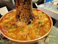 土司铜锅油焖鸡-浩海火烧云傣家菜(京广店)