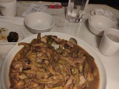 茄子炖蚬子-日丰园海肠水饺·老字号大连海鲜(和平广场店)