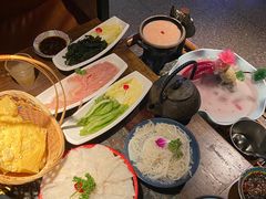 -老牌坊云南鱼豆花火锅(哈西万达店)