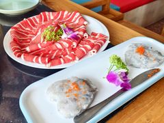 -明何记涮牛肚(品牌首店隋唐植物园南门古城路店)