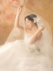 -雪中彩影婚纱摄影·微光艺术中心