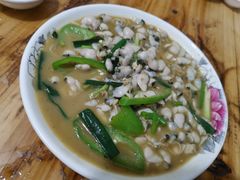 炒螺肉-海口滨海新村143号海南老字号炒菜店