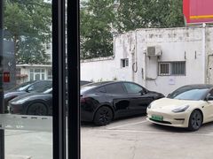 -北亚国超特斯拉授权钣喷中心