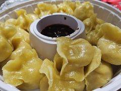 玉米面猪肉酸菜蒸饺-那家老院子东北菜·饺子·小鸡炖蘑菇(艳华街店)