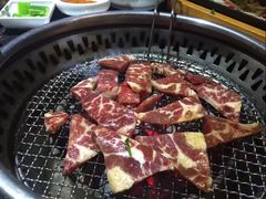 -草家酱蟹炭火烤肉店(珲春南路一店)