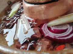 -毛辣果·贵州红酸汤牛肉火锅(西单店)