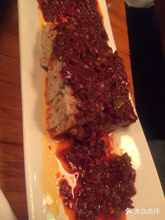 疆Jiang·新疆秘制料理辣皮子面筋图片