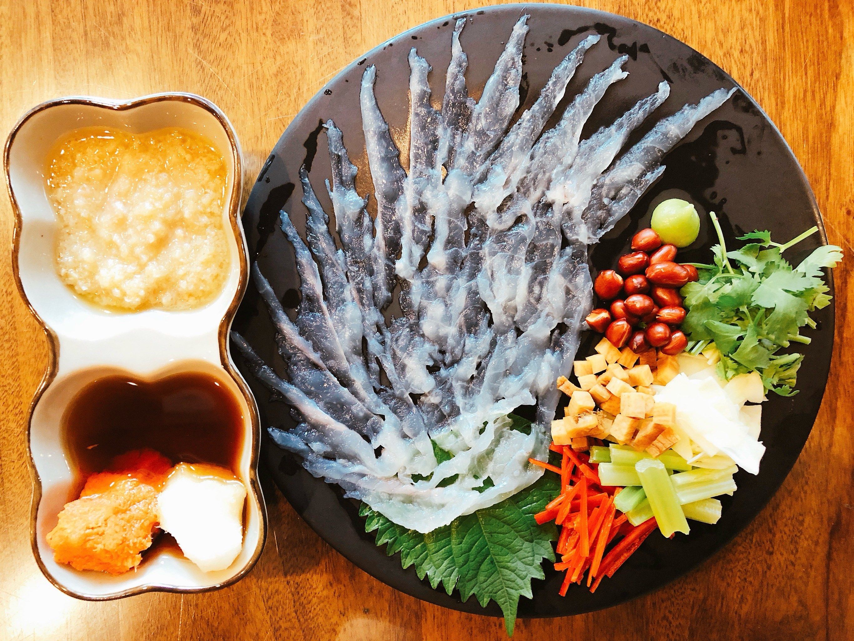 震惊01!坐标成都,河豚97刺身97了解一下