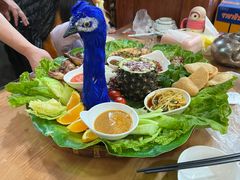 -沐毫傣泐云南菜孔雀宴•手抓饭傣味烧烤(曼听公园店)