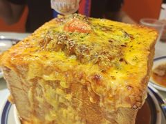 金砖椰香咖喱厚切猪排焗饭-万喜记冰室(大学路店)