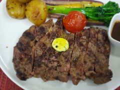 碳烤肉眼牛排及秘制牛排汁-WOLFGANG PUCK KITCHEN & BAR(迪士尼小镇店)