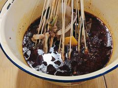 -拈签一笑黄牛肉辣卤串串