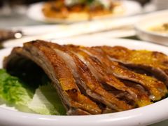 馕坑果木烤羊排-巴扎美食·新疆菜·西域歌舞表演餐厅(新疆大厦店)