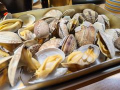 锡纸花蚬子-街角等你.大连海鲜烧烤.经典铁板海鲜串(西安路店)