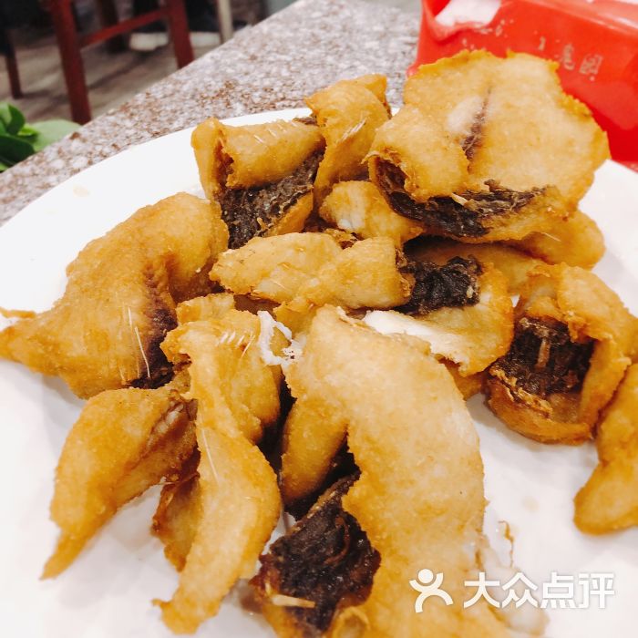 蜀齐苑重庆石锅鱼炸鱼肉图片 - 第1张