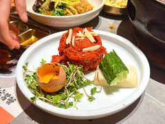 生拌牛肉-草家酱蟹炭火烤肉店(珲春南路一店)