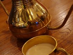 奶茶-阿里家·新疆烤肉酒場 by MIG